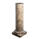 A TURNED MARBLE COLUMN OR PLINTH of cylindrical form on a square base, inscribed twice '