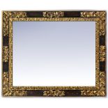 A LATE 20TH CENTURY PARCEL GILT RECTANGULAR WALL MIRROR decorated with acanthus leaf scrolls to