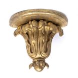 A 'D' SHAPED GILT WALL BRACKET with acanthus leaf carved support, 33.5cm wide x 18cm deep x 32cm