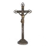 A CONTINENTAL CARVED PAINTED WOODEN CRUCIFIX with reeded cross, 25cm wide x 60cm high