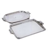 A RECTANGULAR SILVER PLATED TRAY with pierced border, the scroll handles cast with acanthus