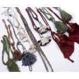 A GROUP OF THREE PAIRS OF CURTAIN TIE BACKS with tassels attached