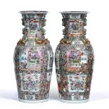 A PAIR OF LARGE CHINESE FAMILLE VERTE FLOOR VASES of baluster form with flaring rims, 42cm