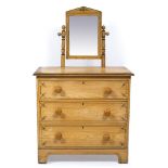 A LATE VICTORIAN SCUMBLE DECORATED PINE DRESSING CHEST with hinged mirror above, three long
