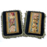 A PAIR OF BLUE VELVET TASSEL BORDERED CUSHIONS set with aubusson style floral tapestry panels,