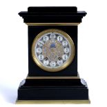 A VICTORIAN BLACK SLATE MANTLE CLOCK the ceramic dial with gilt and blue glazed decoration