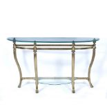 A CAST BRASS AND GLASS TOPPED CONSOLE TABLE the 'D' shaped top on a base with torchere decorations