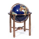 A LATE 20TH CENTURY TERRESTRIAL LIBRARY GLOBE the composite stand within a gimballed, coppered