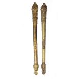 TWO CAST BRASS FURNITURE ORNAMENTS in the form of flaming torcheres, each 7.5cm wide x 80cm high (2)