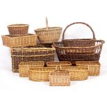 A RECTANGULAR WICKER BASKET 55cm wide x 40cm deep x 30cm high and eleven further wicker baskets (