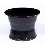 AN ORIENTAL POSSIBLY INDIAN BLACK LACQUERED DRUM TABLE with removable circular top and waisted