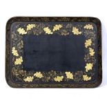 A REGENCY PAPIER MACHE RECTANGULAR TRAY decorated with trailing oak branches and flowers, 75cm x