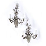 A PAIR OF EARLY 20TH CENTURY VENETIAN GLASS TWIN BRANCH WALL LIGHTS each of urn form with flower and