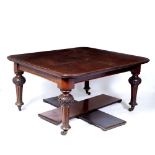 A 19TH CENTURY MAHOGANY EXTENDING DINING TABLE with carved fluted tapering legs, and complete with