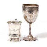 A VICTORIAN SILVER WINE GOBLET engraved with ribbon tied swags together with a silver christening