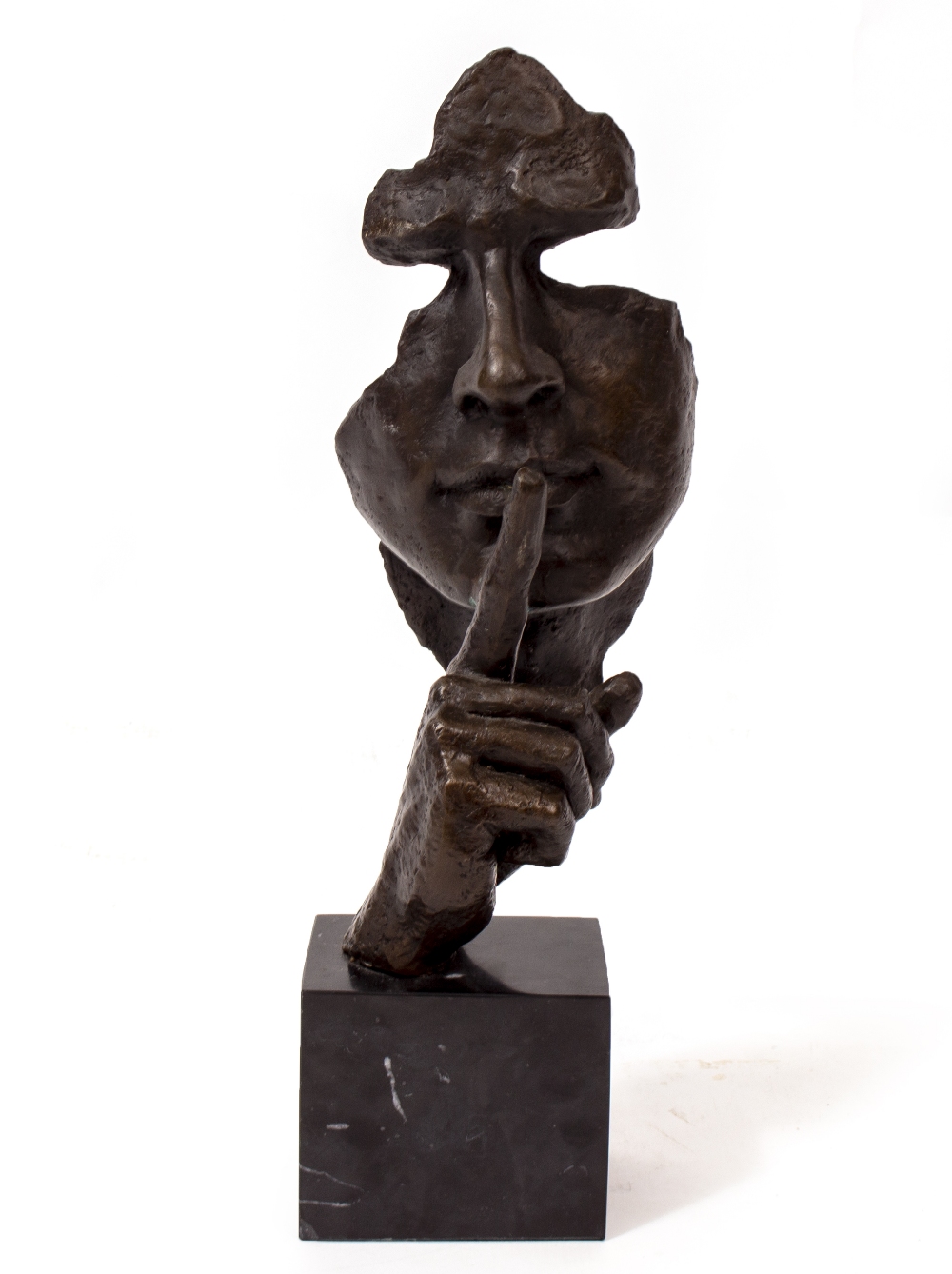 A MODERN BRONZE SCULPTURE depicting a man's face and hand, mounted on a marble plinth , 48cm high