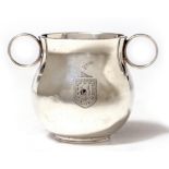 A 20TH CENTURY SILVER TWIN HANDLED BOWL with engraved 'F.L.G' and coat of arms, with marks for