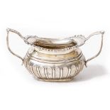 AN EDWARDIAN TWIN HANDLED SUGAR BASIN in the Georgian style with marks for Sheffield 1905 and