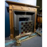 A GEORGIAN STYLE PINE FIRE SURROUND 129cm wide x 15cm deep x 114cm high together with a cast iron