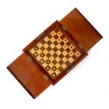 A LATE 19TH/EARLY 20TH CENTURY TRAVELLING CHESS SET with red stained and natural bone chess pieces