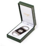 A DAVIDOFF CIGAR CUTTER in fitted case