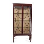 A MAHOGANY DISPLAY CABINET with three glass shelves, 90.5cm wide x 38.5cm deep x 81.5cm high
