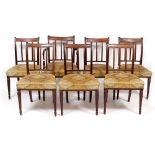 A SET OF SEVEN GEORGIAN STYLE MAHOGANY DINING CHAIRS with reeded bar backs, vertical splats and