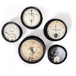 A GROUP OF FIVE BLACK PAINTED DIALS two measuring amperes one measuring milliamperes, a frequency