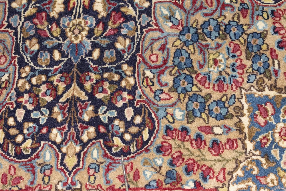 A MIDDLE EASTERN RED AND BLUE GROUND RUG with geometric foliate decoration, 144cm x 242cm - Image 2 of 2