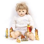 AN EFFANBEE DOLL and a set of plastic nativity figures