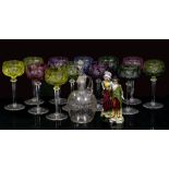 A SET OF TWELVE VAL ST LAMBERT COLOURED AND CUT HOCK GLASSES each 18cm high; a 19th century decanter