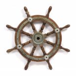 A BRASS BOUND SHIP'S WHEEL 76cm diameter overall