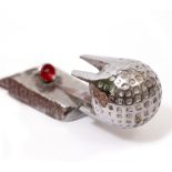 A DESMO CHROME PLATED CAR MASCOT in the form of a struck golf ball, 12cm long