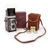 A WELTAFLEX TWIN LENS MIRROR REFLEX CAMERA with case, original box and accessories