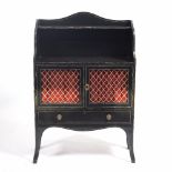 A REGENCY BLACK LACQUERED CHIFFONIER with a raised back above two gilt metal lattice inset doors,