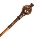 A MACE with a copper head and crown finial, 121cm
