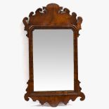 A GEORGE III WALNUT FRET FRAMED WALL MIRROR 43.5cm wide x 75.5cm high