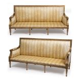 A PAIR OF GILDED CREAM UPHOLSTERED SOFAS 193cm x 64cm x 96cm