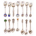 A COLLECTION OF SILVER AND WHITE METAL TEA SPOONS some in sets, many with decorative terminals