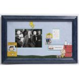CHARLES SCHULZ SIGNED SNOOPY CARTOON with a photograph of the Peanuts creator, mounted in a