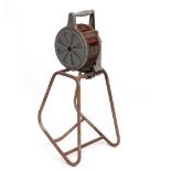 A SECOND WORLD WAR AIR RAID SIREN on stand, 83cm high