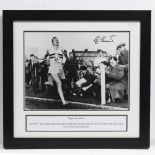 A ROGER BANNISTER SIGNED PHOTOGRAPH completing the four minute mile, photograph measures 30cm x