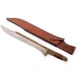 A SOUVENIR PRESENTATION INDIANIA JONES MACHETE with brass and treen grip, cast in the form of an