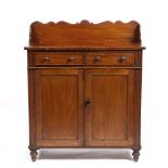 A 19TH CENTURY MAHOGANY SIDE CABINET with galleried back, two drawers, cupboard doors and turned