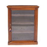 A VICTORIAN MAHOGANY BOOKCASE with a single glazed door and a plinth base, 84cm wide x 26.5cm deep x