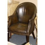 A BROWN LEATHER TUB CHAIR with square tapering legs, 60cm wide x 96cm high