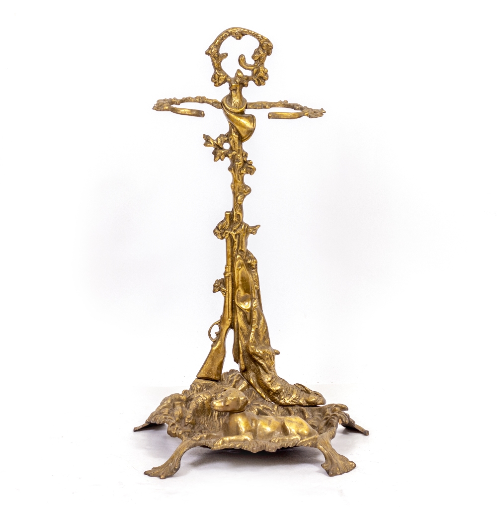 A BRASS STICK STAND/UMBRELLA STAND with hunting theme, 56cm high