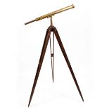 A VICTORIAN BRASS TELESCOPE by Cary of 181 The Strand London, 101cm long unextended and on an oak