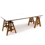 A ZANOTTA LEONARDO WORKING TABLE designed by Achille Castiglioni with an adjustable beech wood frame