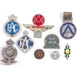 A SMALL COLLECTION OF AUTOMOBILE BADGES to include a cast Royal Automobile Club badge with
